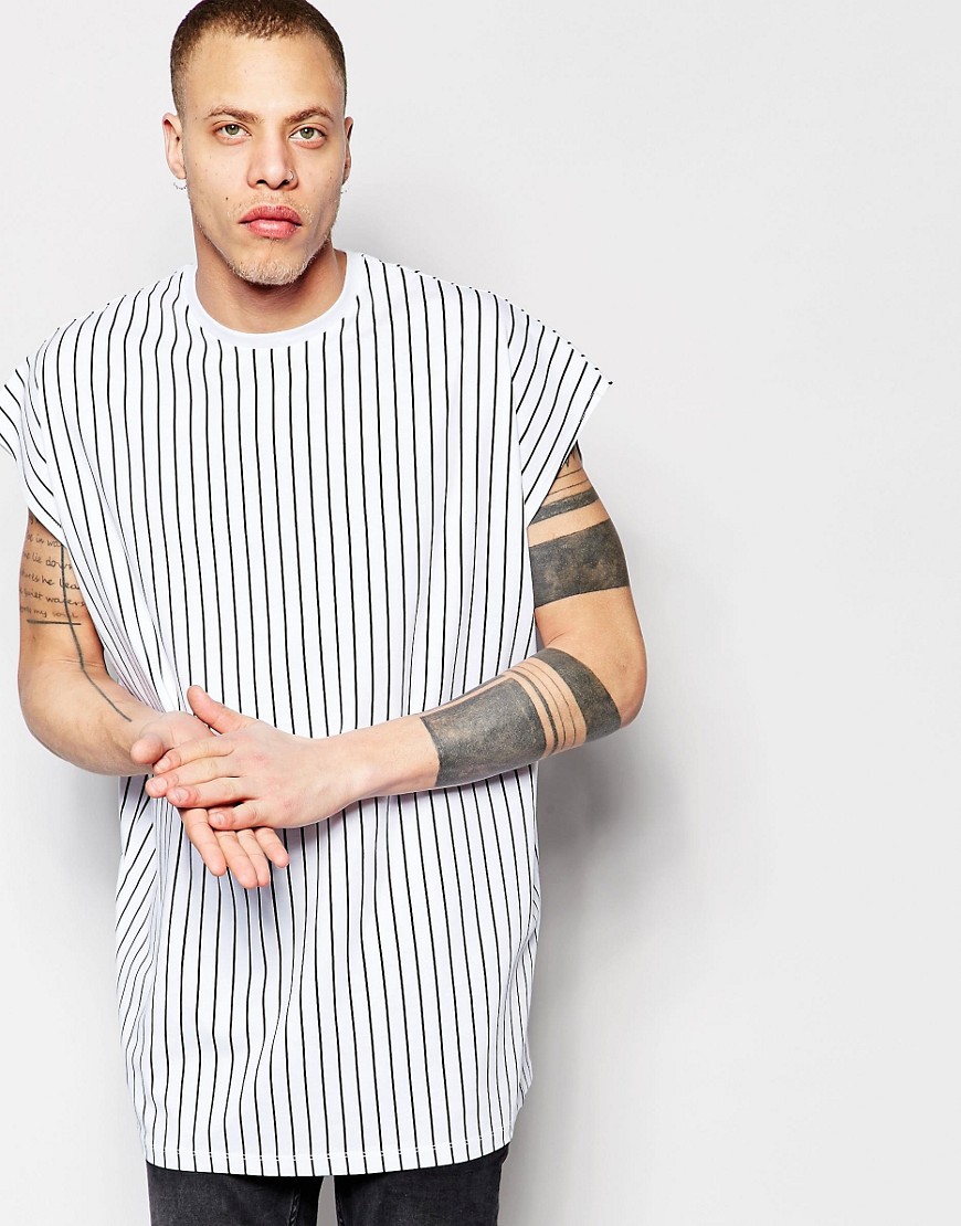 Comprar Camiseta sin mangas extragrande a rayas verticales en blanco de ASOS al mejor precio