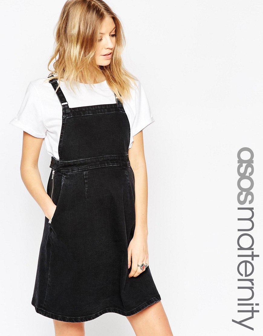 Comprar Vestido estilo pichi vaquero acampanado en negro desgastado de ASOS Maternity al mejor precio